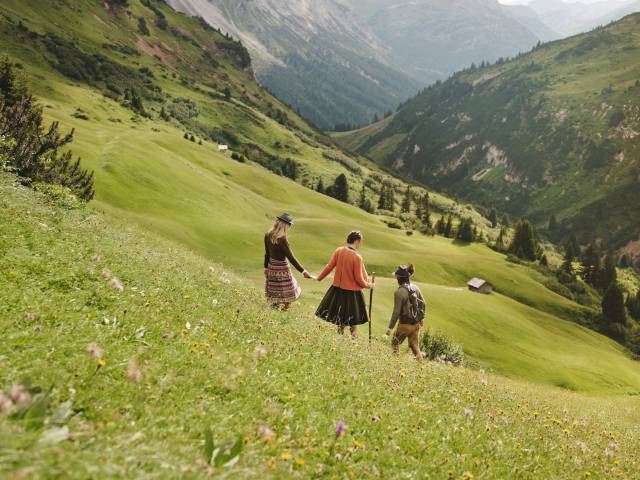 Hiking on the mountain meadow in Lech am Arlberg